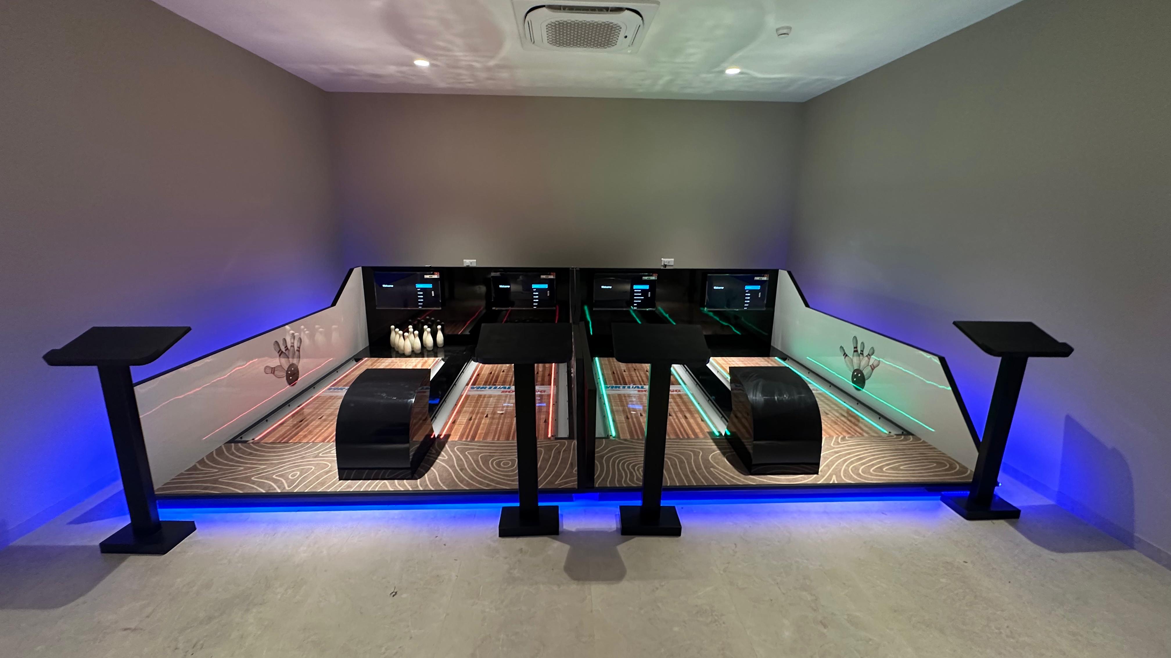virtual bowling system components, interactive gaming elements, user-friendly interface, immersive experience, customizable settings