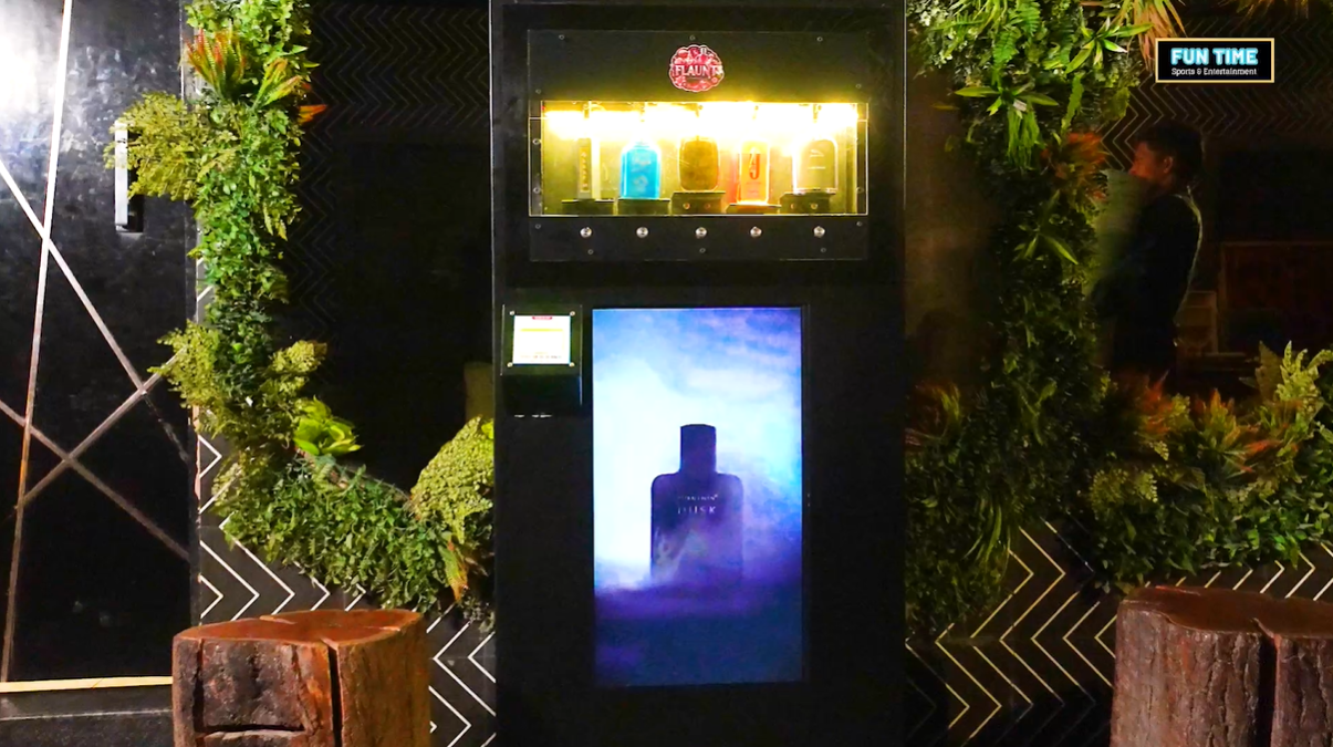Flaunt perfume vending machine installed in a premium commercial environment