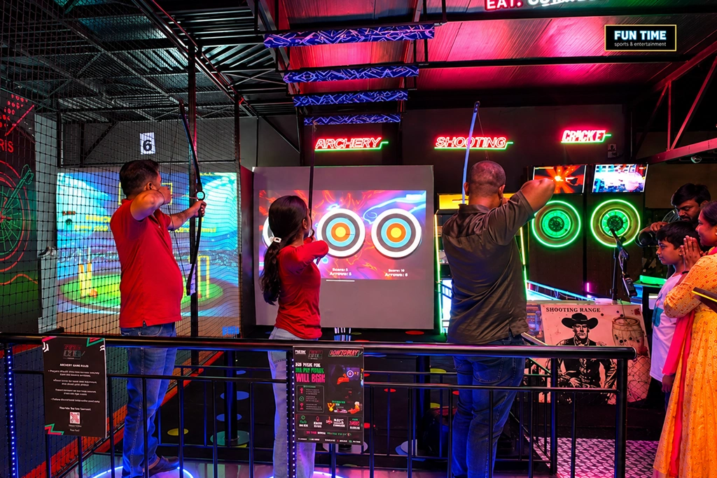 Family or group enjoying arcade games within a restaurant environment