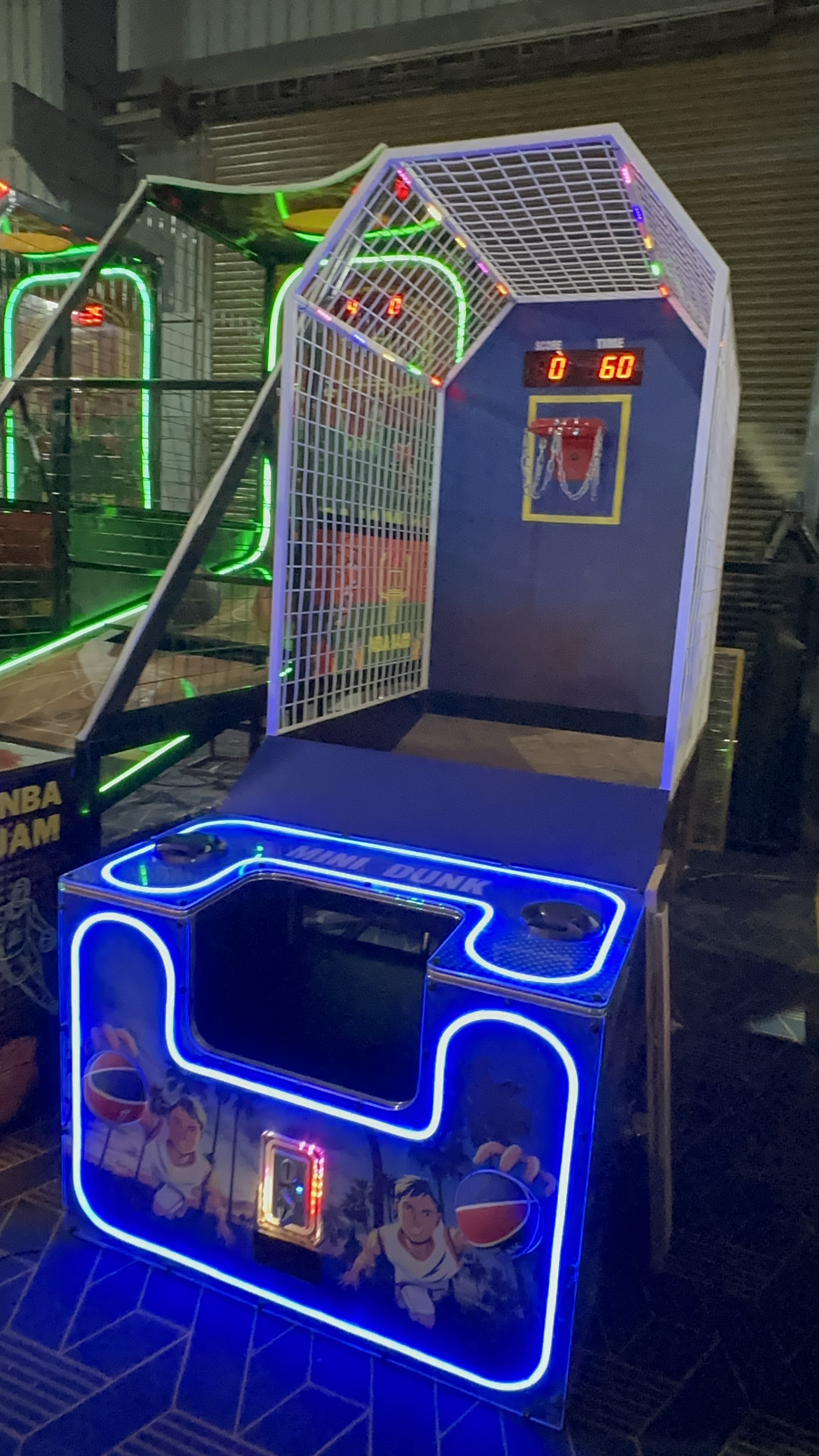 basketball arcade internal structure, reinforced steel frame, ball return mechanism, technical engineering view, professional lighting