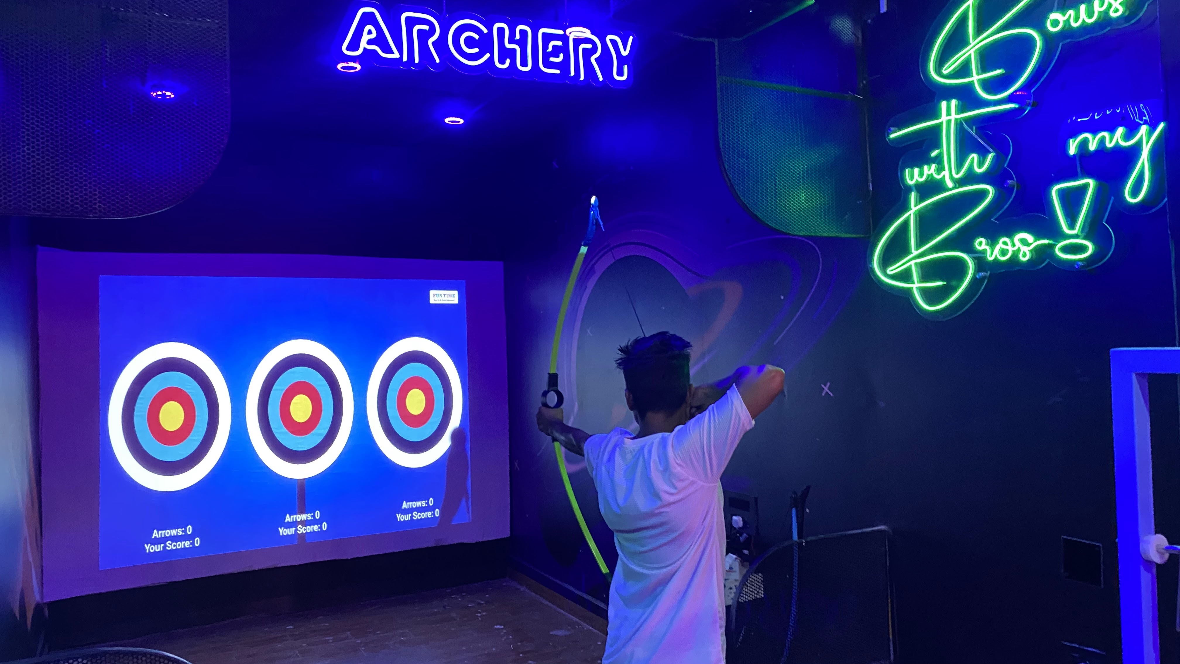 digital archery system internal view, projection equipment, bow mounting system, optical sensors, technical setup, professional lighting