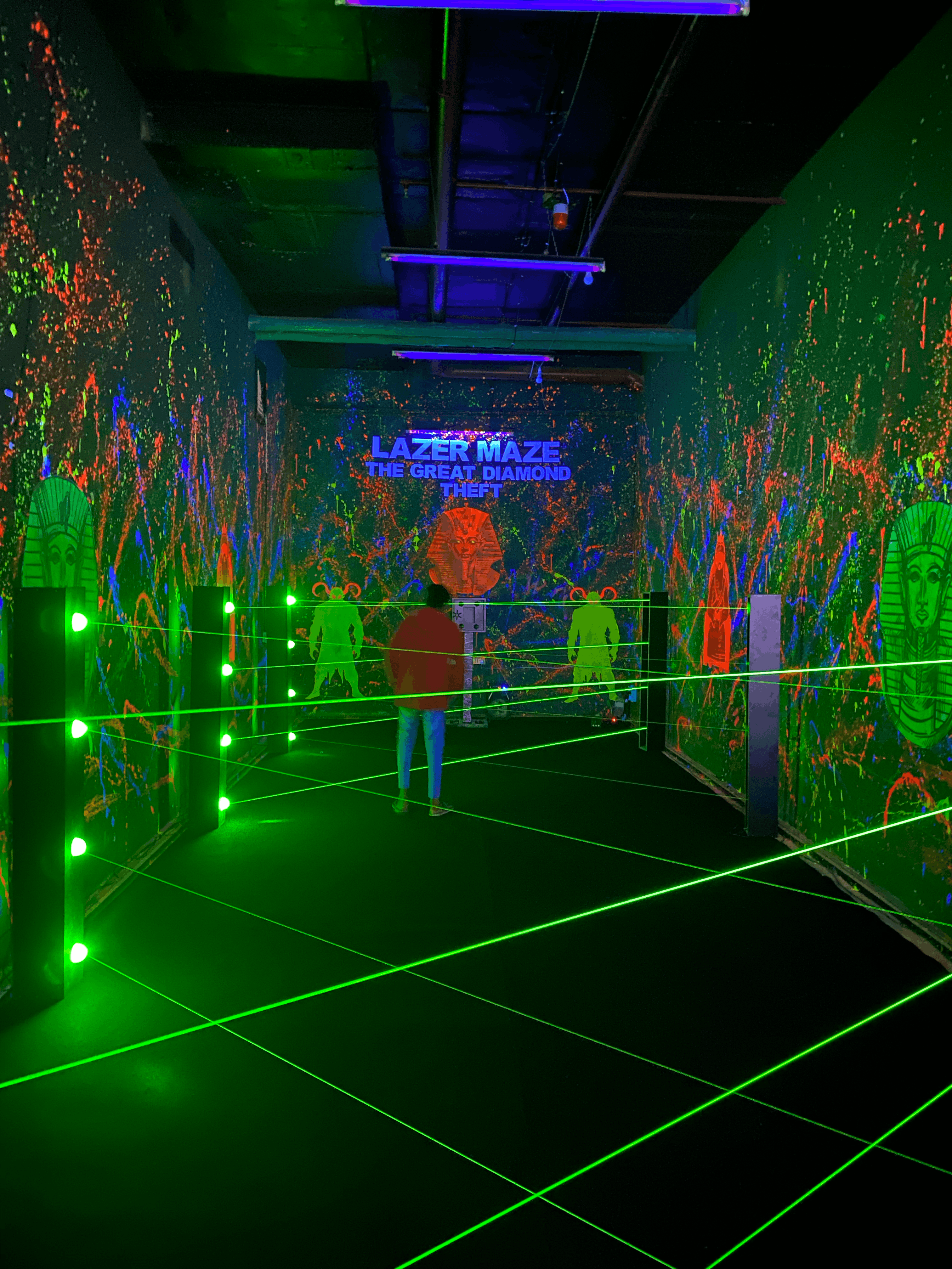 laser maze internal structure, modular steel frame, sensor array, beam projectors, technical engineering view, professional lighting