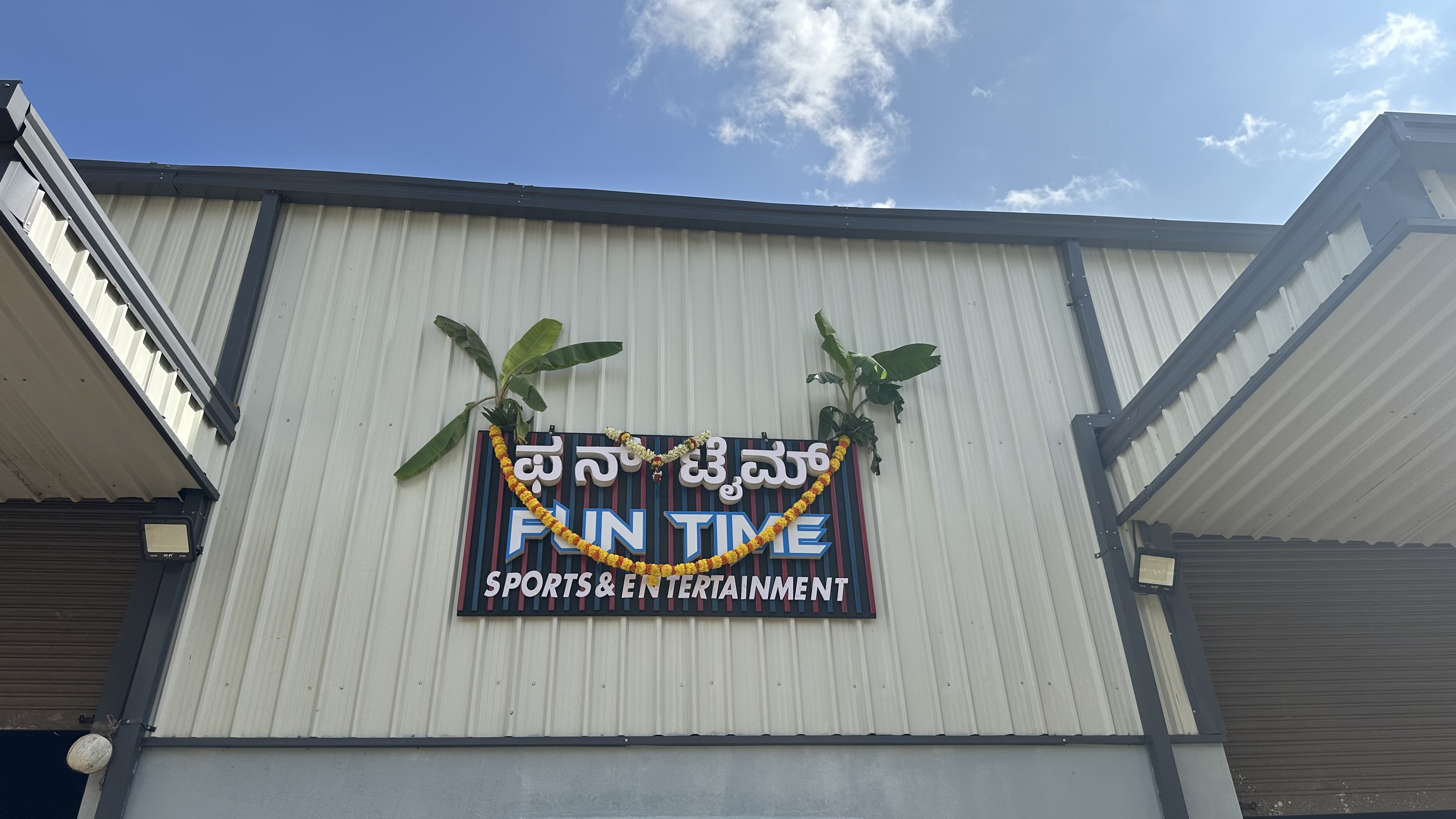 modern manufacturing facility, CNC machines, electronics assembly line, industrial workspace, Bangalore factory, high-tech production floor, professional lighting, wide angle view