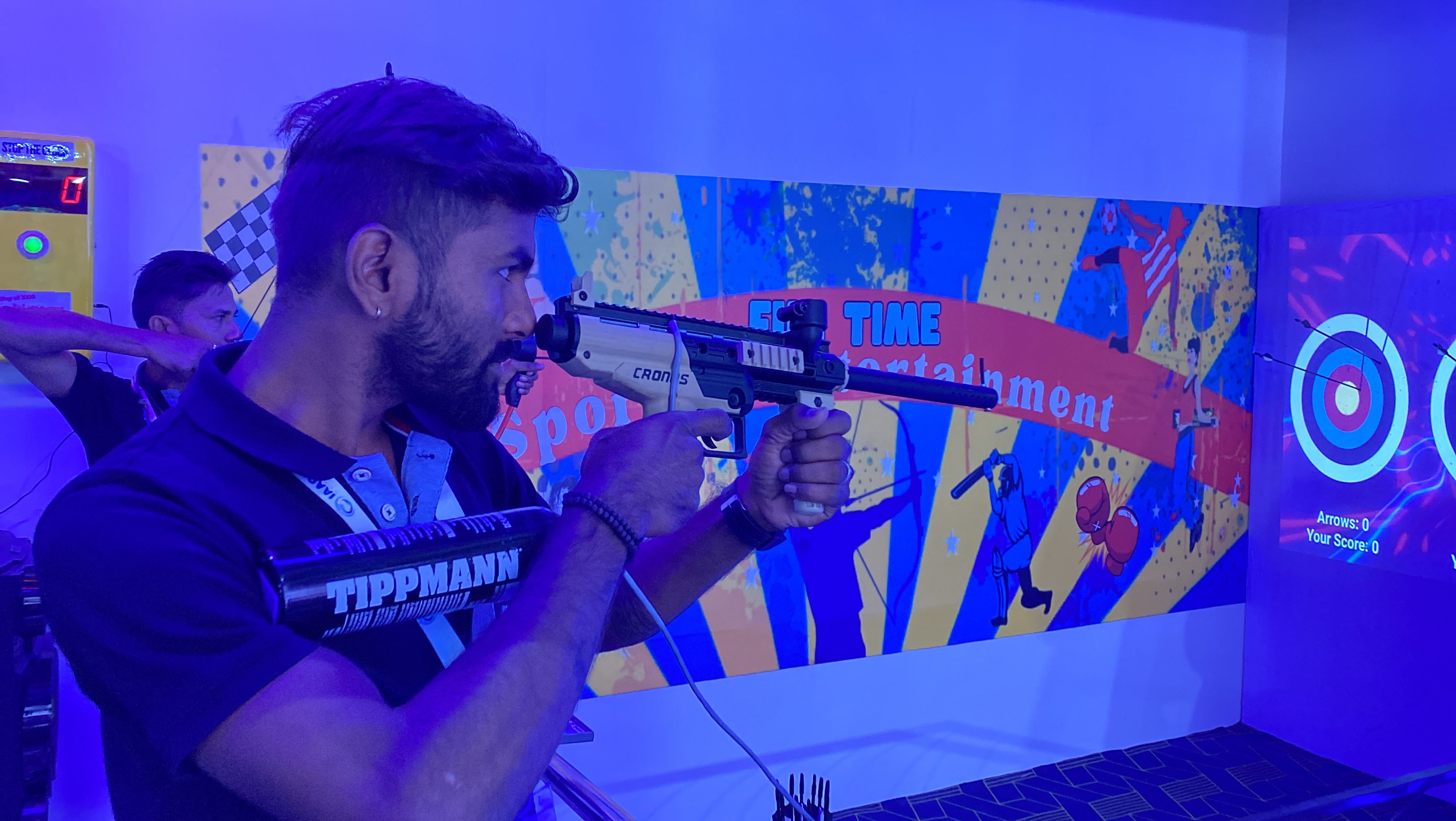 shooting arena internal structure, CO₂ marker system, laser alignment module, sensor targets, technical engineering view, professional lighting