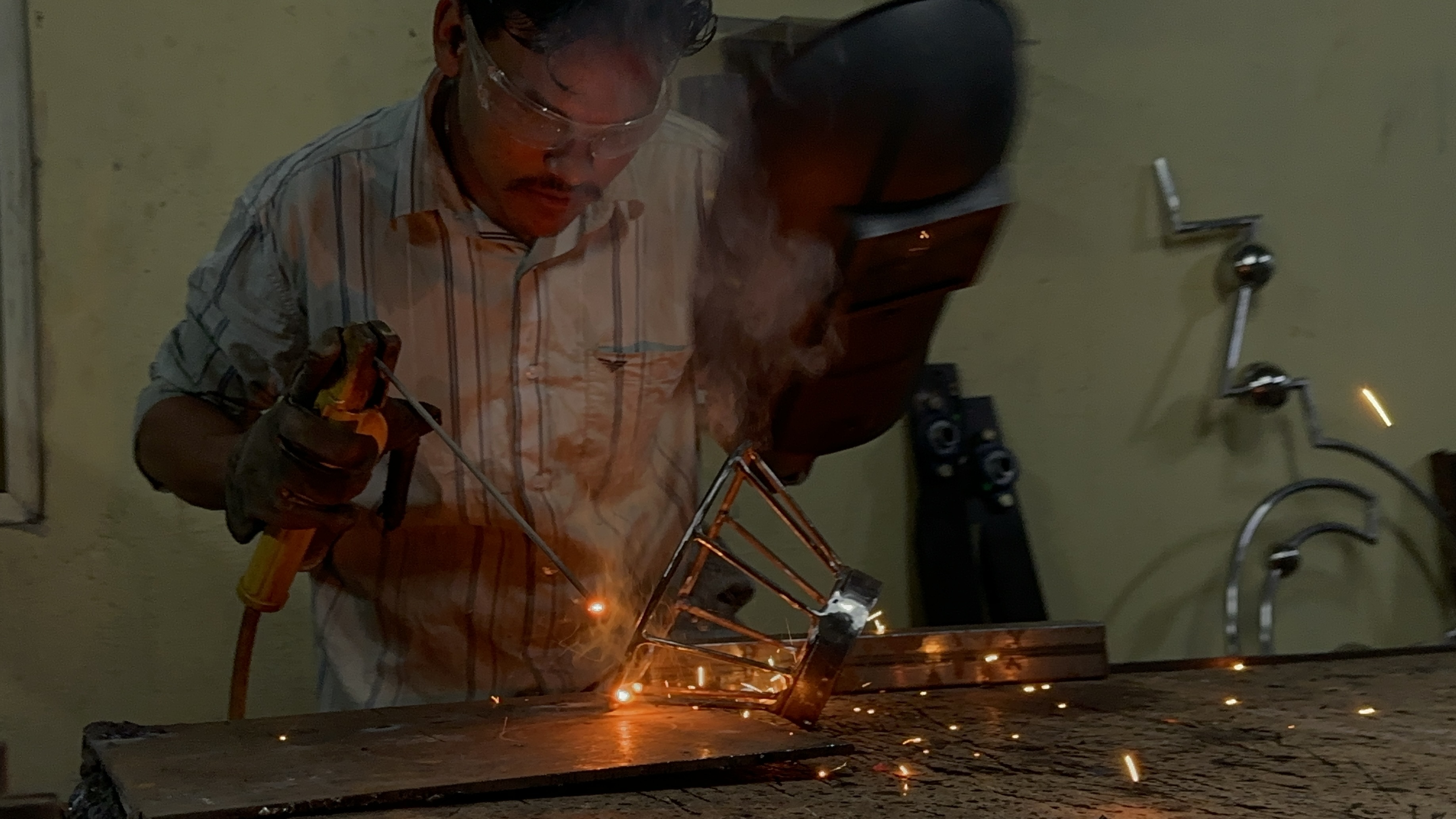 CNC machine cutting wood components, precision manufacturing, industrial equipment