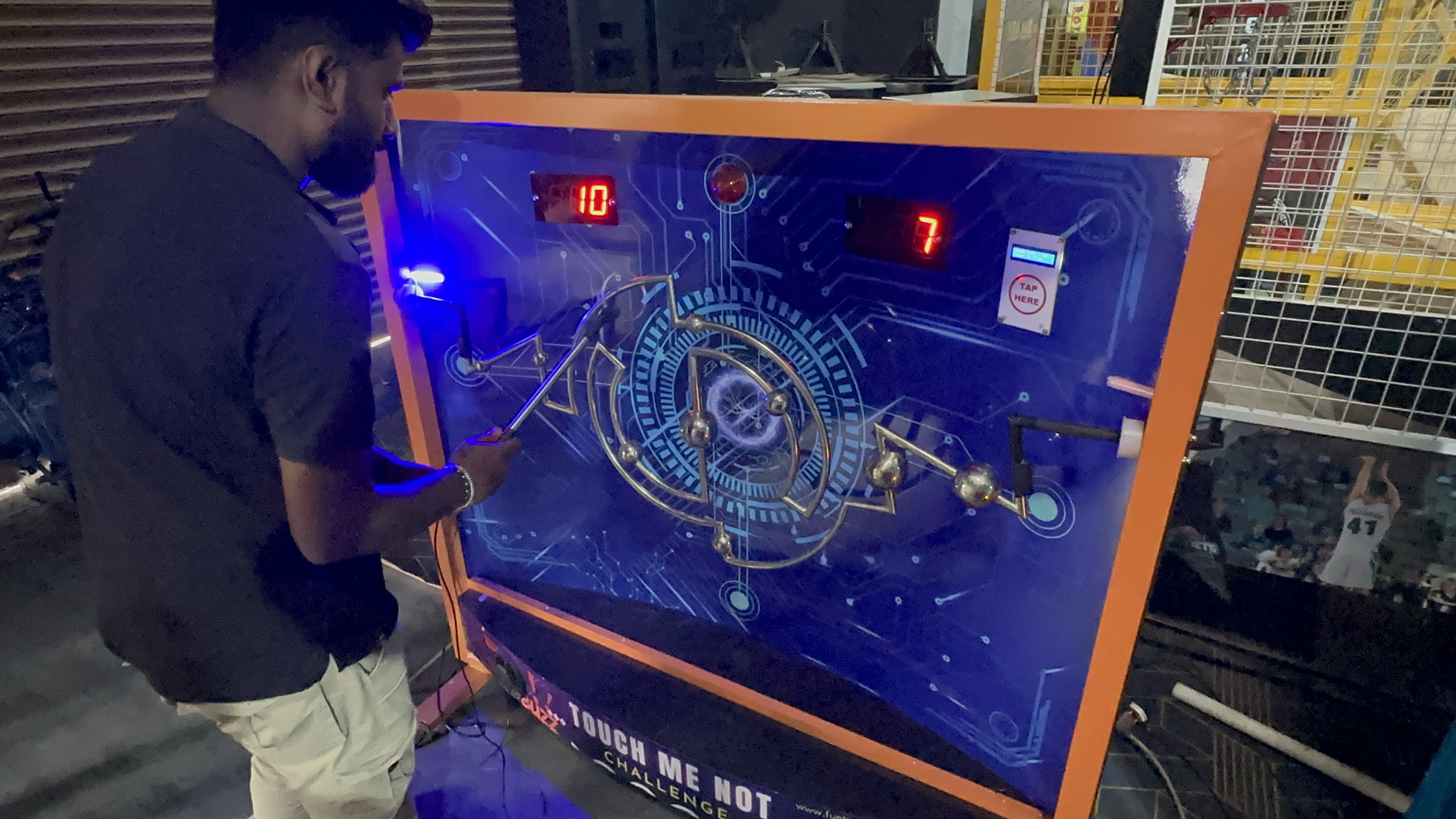 LED illuminated obstacle grid, glowing rods, vibrant arcade lighting